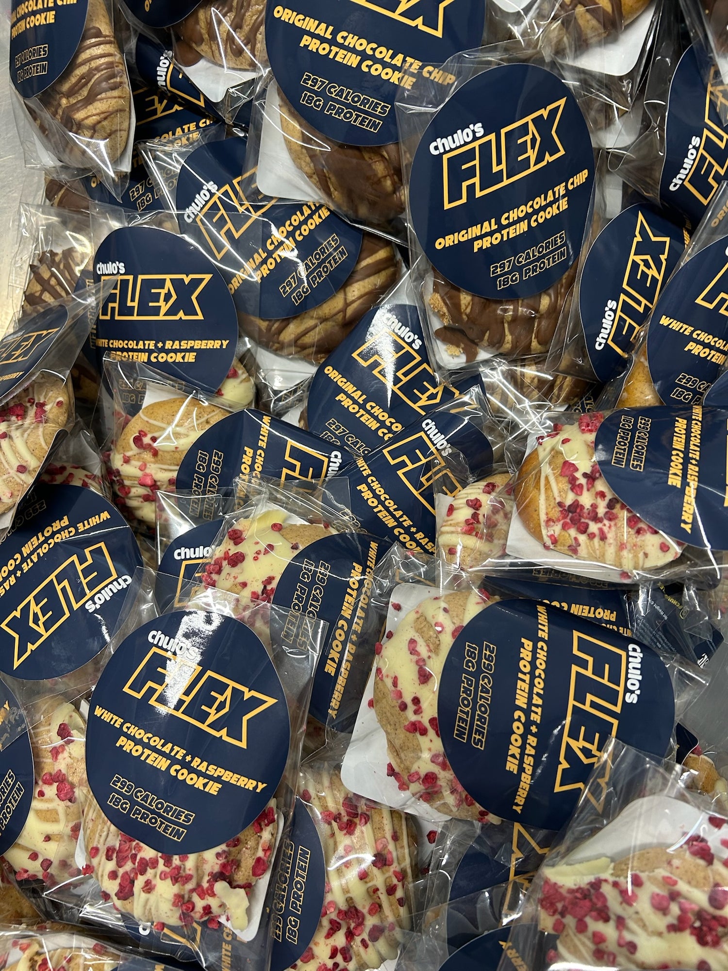 Stack of assorted protein cookies ready for nationwide delivery